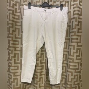 White mid rise jeans.